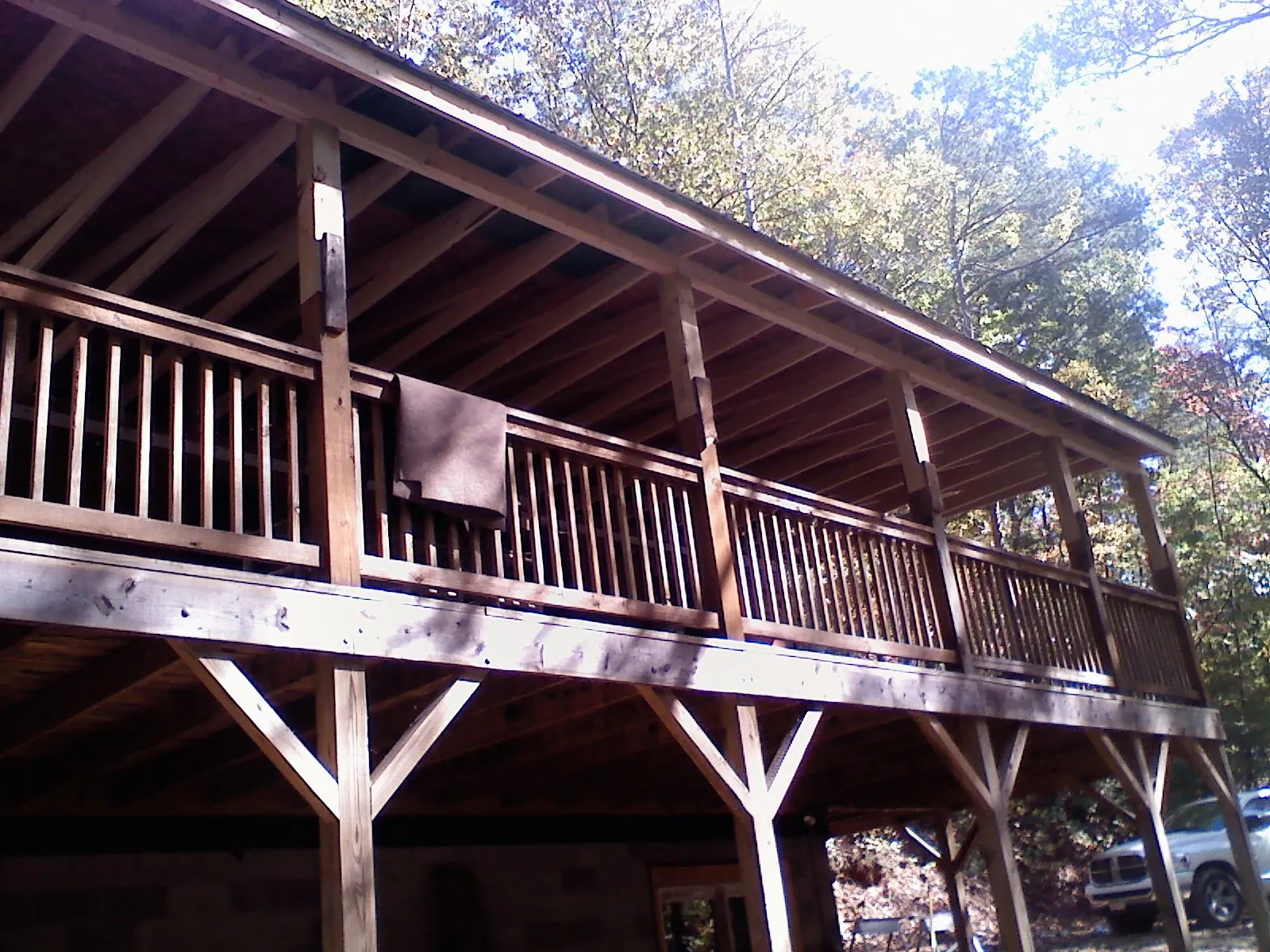 Timber framing under a new elevated porch and deck — Roof Leak Repair in Three Forks by Roofing Brothers